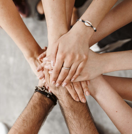 Teamwork, unity concept, group of friends put their hands togeth